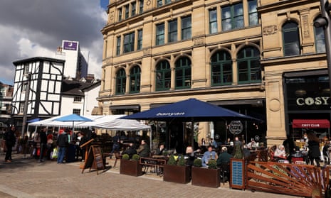 Busy outdoor beer gardens in Manchester, England.