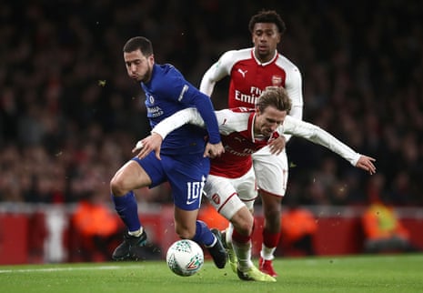 Chelsea’s Eden Hazard is stopped by Arsenal’s Nacho Monreal by foul, rather than fair, means.