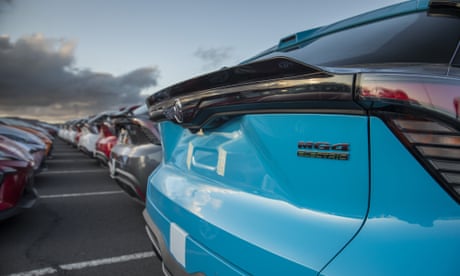 Line of new cars in a carpark