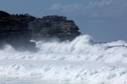 Large waves crash against rocks on Bronte beach in Sydney