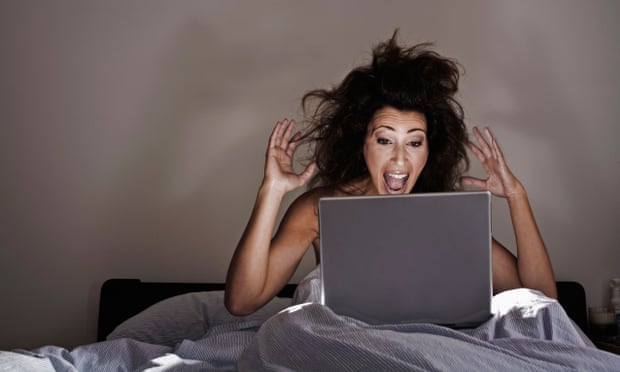 computer user in bed