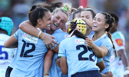 The Waratahs celebrate after scoring a try during the Super Rugby Women’s grand final match