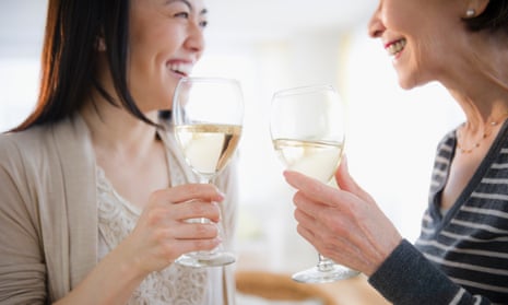 Japanese mother and daughter drinking white wine