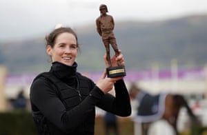 Cheltenham, UKRachael Blackmore poses with the Ruby Walsh trophy as leading jockey of the Festival after her six victories during day four of the Cheltenham National Hunt Racing Festival in Gloucestershire