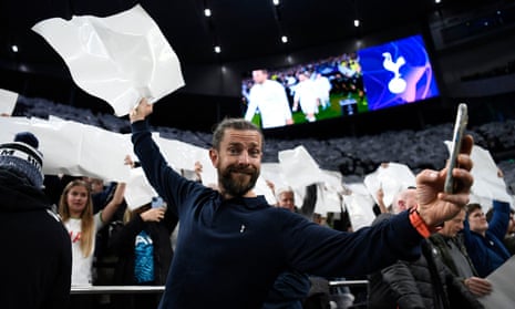 The players take to the pitch as the Tottenham Hotspur take part in display to greet them.