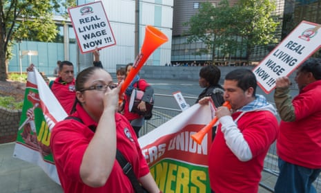 Cleaners protest for living wages at Southwark crown court in London.