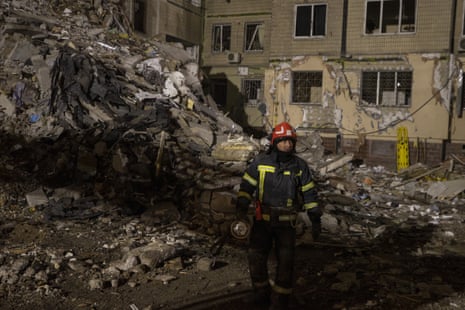 Search and rescue works in the wreckage area after a Russian missile strike in Dnipro, Ukraine on 15 January.