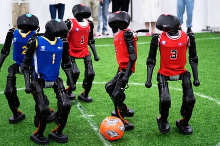 K1 robots train at a pre-competition exploration camp in Beijing, China, before the 2025 RoboCup in Salvador, Brazil.