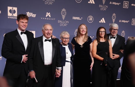 Sir Stanley Matthews' family pose together in formal wear at the Ballon d'Or red carpet