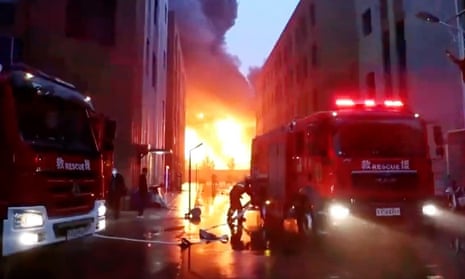 Firefighters at a factory fire in the Chinese city of Anyang