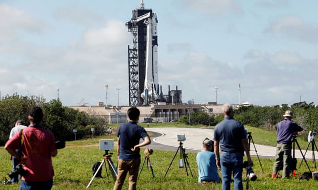 Photographers set up remote cameras at Kennedy Space Center in Cape Canaveral, Florida, in anticipation of the launch moved to Sunday. 