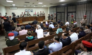 Jordanian judges reside over the trial of Maarik Al-Tawaiha, charged with the killing of three American military trainers outside an army base last year. 3318.jpg?w=300&q=55&auto=format&usm=12&f
