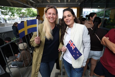 Annie Sattler (R) and Renee Dale (L) wait in queues as Ikea opens in Auckland New Zealand.