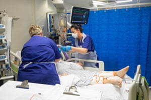 Tracy Newey attends to a non-Covid patient in critical care.