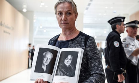 The lung specialist Irène Frachon poses with a book depicting portraits of ‘Mediator victims’ at the courthouse in Paris before the start of the Servier trial in September 2019.