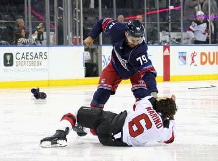 Devils-Rangers game devolves into 10-player brawl after opening faceoff ...
