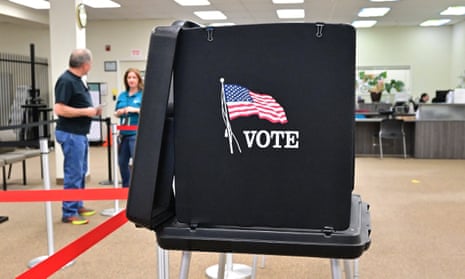Ballot box with American flag and 'vote' sign on it