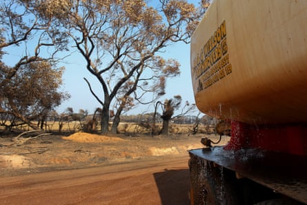 A water truck delivers water in the Parndana region of fire-ravaged Kangaroo Island on Wednesday. Bushfires continue to burn on the island.