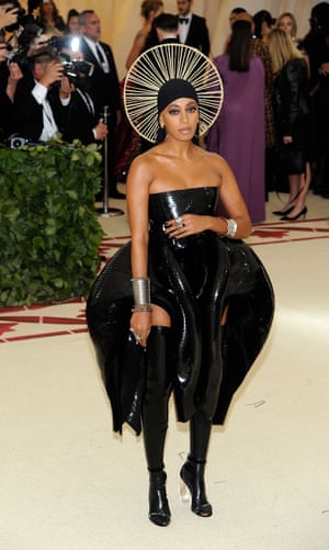 Solange wears an Iris van Herpen latex creation and a braided halo, which she told Teen Vogue was inspired by black Madonna. The singer said she was especially excited because her du-rag had “My God wears a du-rag” written on it