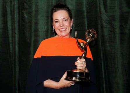 Olivia Colman poses with her Emmy award.