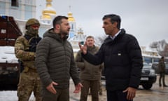 Handout photo issued by the Ukrainian Presidential Press Office of Prime Minister Rishi Sunak, speaking with Ukraine President Volodymyr Zelensky as they look at destroyed Russian military vehicles in Kyiv, Ukraine. Ukrainian Presidential Press Office/PA Wire