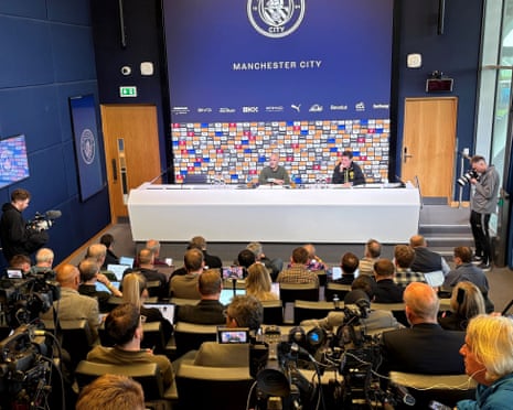 Manchester City manager Enzo Maresca speaks at a press conference facing journalists and cameras