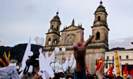 People celebrate in Bolivar Square in Bogota, the signing of the peace agreement between the Farc and the Colombian government.