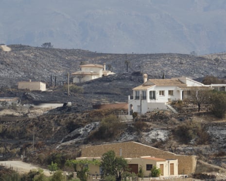 Emergency operations continue near Bedar as security forces restrict access to the wildfire-affected area and direct local residents away from danger in Almeria province, Spain.