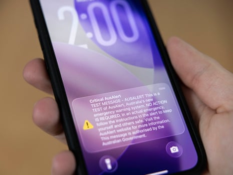A smartphone displays the Australian government’s AusAlert emergency warning test notification during the nationwide test of the emergency alert system on Monday.