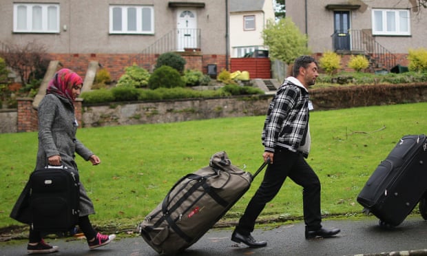 Syrian refugee families arrive at their new homes on the Isle of Bute in December 2015.