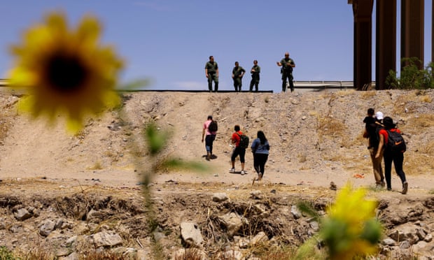 Migrants at the US-Mexico border in May.