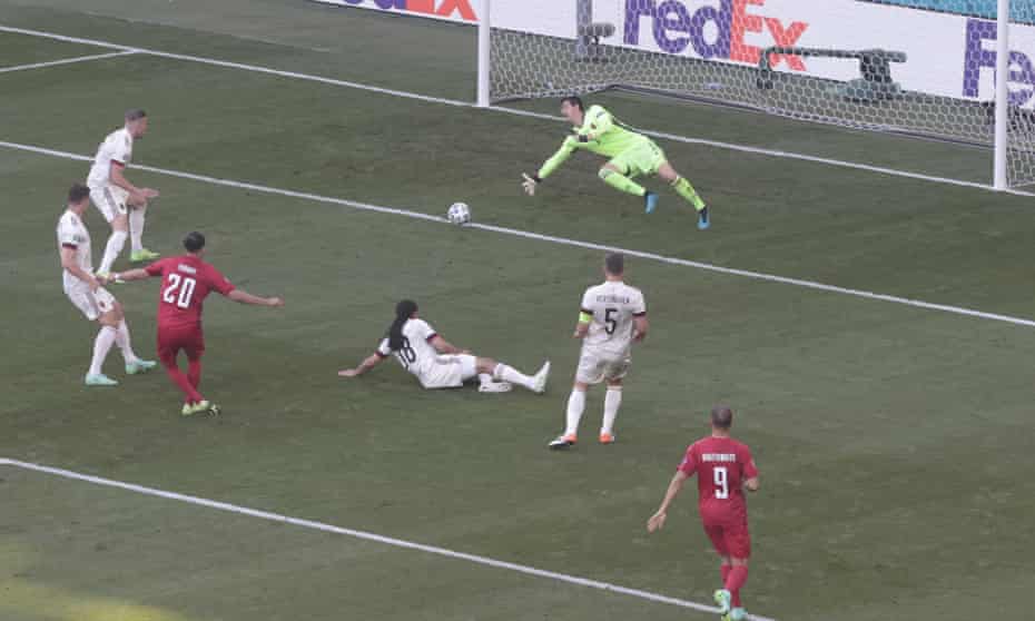 Yussuf Poulsen exploits Belgium’s defensive uncertainty to put Denmark ahead.