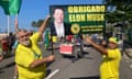 Supporters of ex-president Jair Bolsonaro hold up a sign saying ‘Thank you Elon Musk'