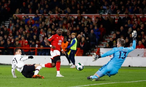 Nottingham Forest's goalkeeper Wayne Hennessey saves from Manchester United's Antony.