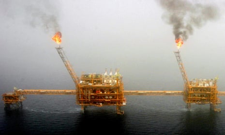 Gas flares from an oil production platform at the Soroush oil fields in the Persian Gulf, south of Tehran.
