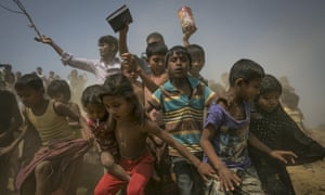 Rohingya Refugees Run To Receive Aid Parcels At Chittagong Port In Bangladesh Rohingya Refugees Run To Receive Aid Parcels At Chittagong Port In Bangladesh