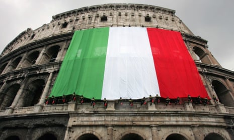 Italian flag hangs from side of Colosseum in Rome