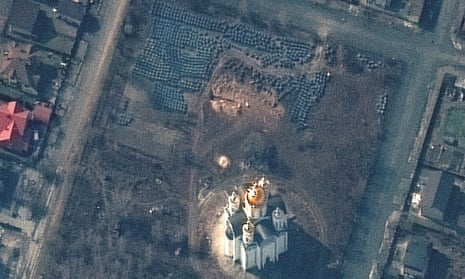 A satellite image shows a mass grave site near the Church of St Andrew and Pyervozvannoho All Saints, in Bucha, Ukraine.