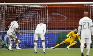 Raúl Jiménez converts a penalty kick past Dutch goalkeeper Tim Krul.