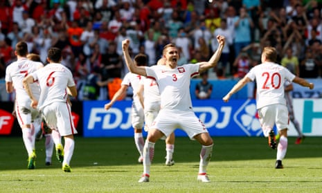 Poland’s Artur Jedrzejczyk celebrates after Grzegorz Krychowiak scores during the penalty shootout to win the match.