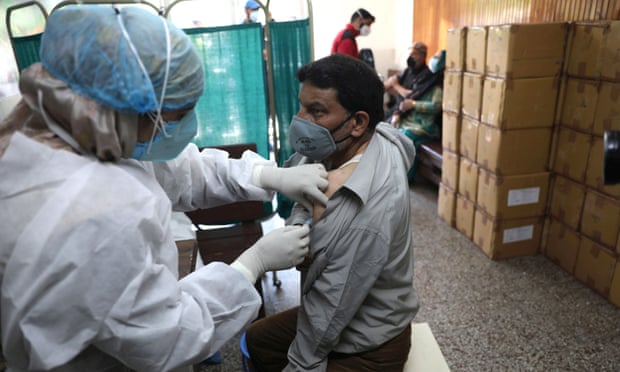 A Kashmiri man receives the Covid vaccine