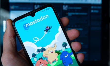 And image of a phone with the social media app Mastodon on its screen