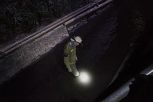 An environmental activist from Badega Lingkungan, is patrolling a canal