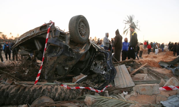 Wreckage of car after US airstrike on Islamic State training camp in Libya