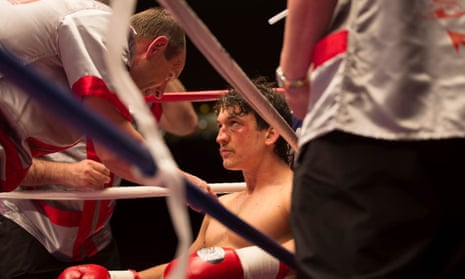 Miles Teller as Vinny Paz, with Aaron Eckhart as his trainer, in Bleed for This.