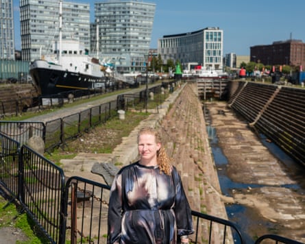 Liz Stewart, head of the Museum of Liverpool, in front of dry docks used to repair slaver’s ships in the 18th and 19th centuries
