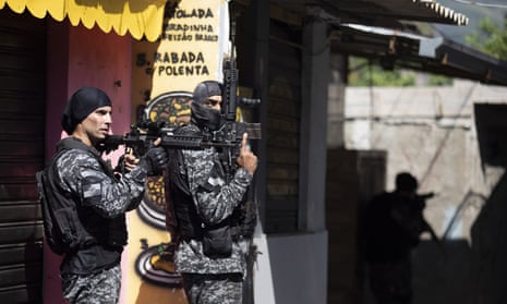 Police conduct an operation against alleged drug traffickers in the Jacarezinho favela of Rio de Janeiro, Brazil, Thursday, May 6, 2021. (AP Photo/Silvia Izquierdo)