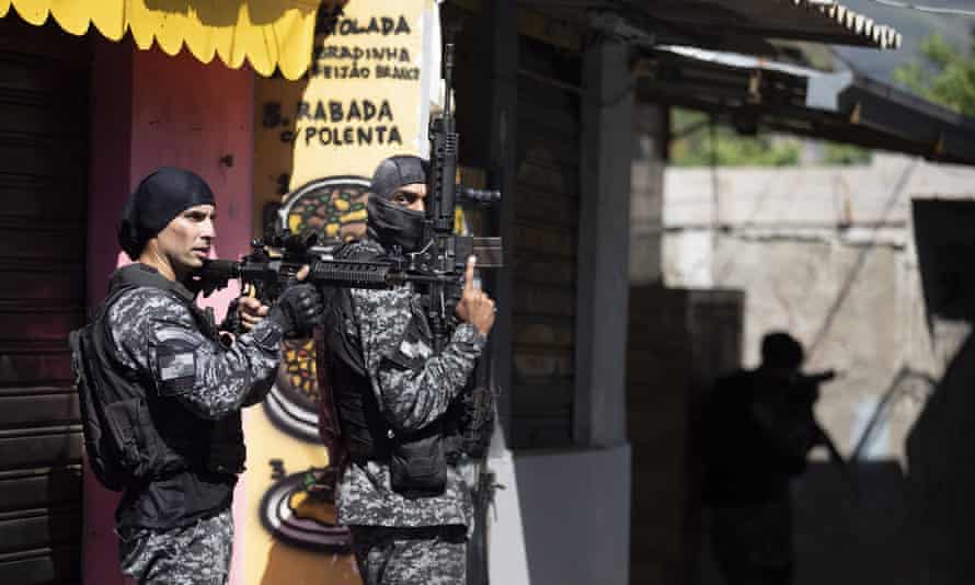 Police conduct an operation against alleged drug traffickers in the Jacarezinho favela of Rio de Janeiro, Brazil, on Thursday.