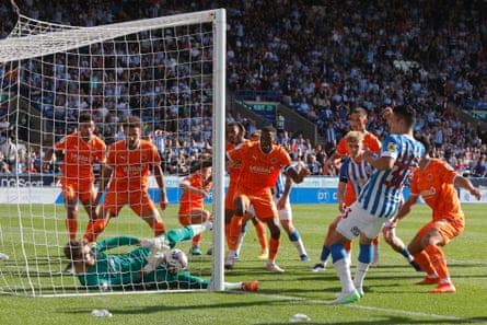 Huddersfield’s Yutu Nakayama appears to score, only for the goal not to be given after the goal line technology fails to register. Blackpool would go on to win 1-0.