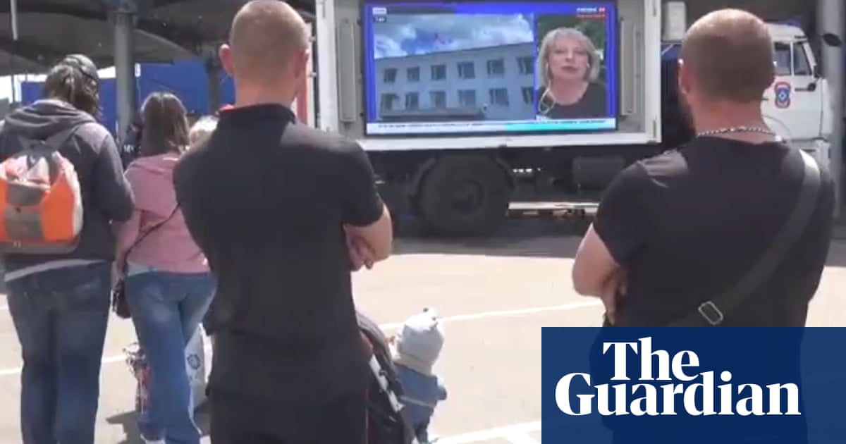 Russia uses Orwellian propaganda news vans in Mariupol